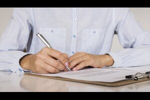 Person signing a contract or a certificate