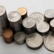 Still life of dollar coins piles