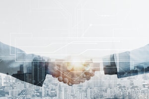 Business partners handshake global corporate with technology concept