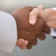 A closeup of business colleagues shaking hands