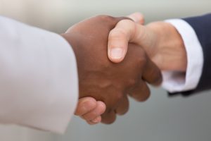 A closeup of business colleagues shaking hands